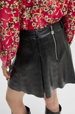 Faux-leather mini skirt with embossed houndstooth pattern